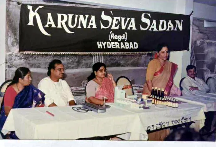 Doctors seated at a KSS medical camp